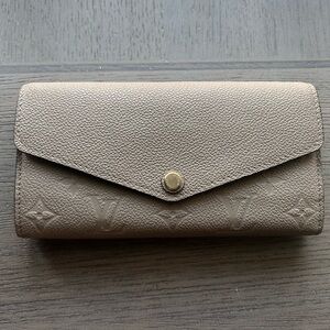 Louis Vuitton Empreinte Sarah Wallet (Color: Turtledove)